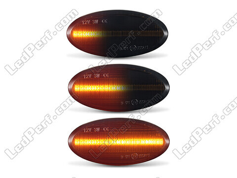 Lighting of the black dynamic LED side indicators for Mazda 2 phase 2